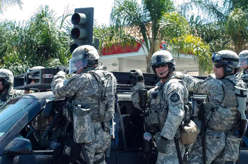 These are not American military in Iraq -- they're police officers at a protest in Anaheim, CA. Ironically, the protesters were protesting police brutality. Credit: Chase Carter, flickr